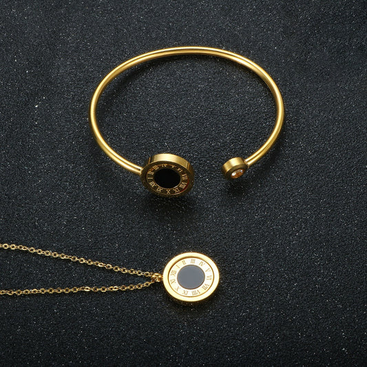 Cuff and necklace set with rotating coloured stone