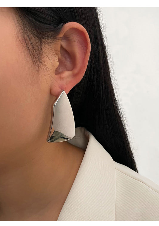 Silver polished asymmetric earrings