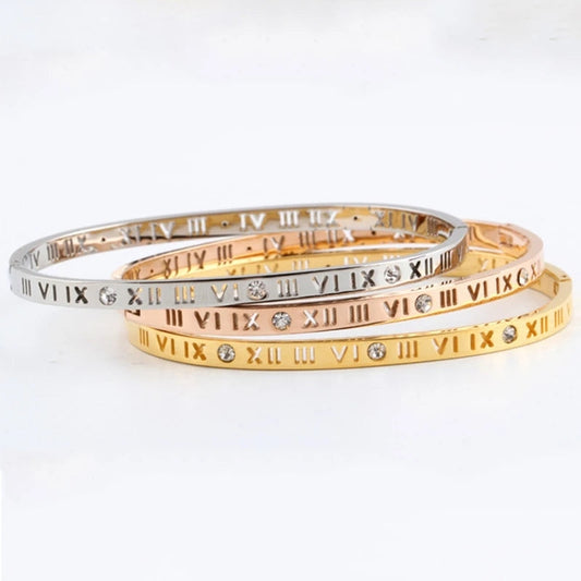 Stack of three tone roman numeral bangles